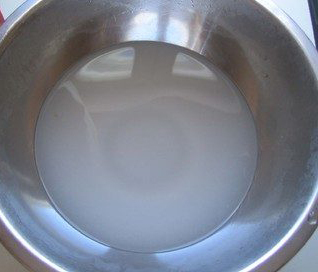 soda is mixed in a pot with water